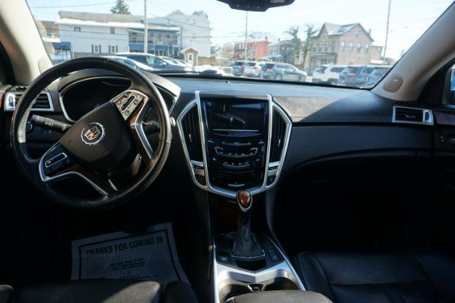 2015 Silver Coast Metallic /Ebony/Ebony Accents Cadillac SRX Luxury Collection (3GYFNEE36FS) with an 3.6L V-6 gasoline direct injection engine, located at 312 Centre Ave, Schuylkill Haven, PA, 17972, (570) 593-5278, 40.638130, -76.177383 - Photo#31