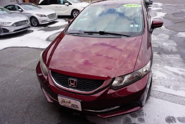 2015 Crimson Pearl /Beige Honda Civic LX (19XFB2F51FE) with an 1.8L I-4 i-VTEC variable valve control engine, located at 312 Centre Ave, Schuylkill Haven, PA, 17972, (570) 593-5278, 40.638130, -76.177383 - Photo#1