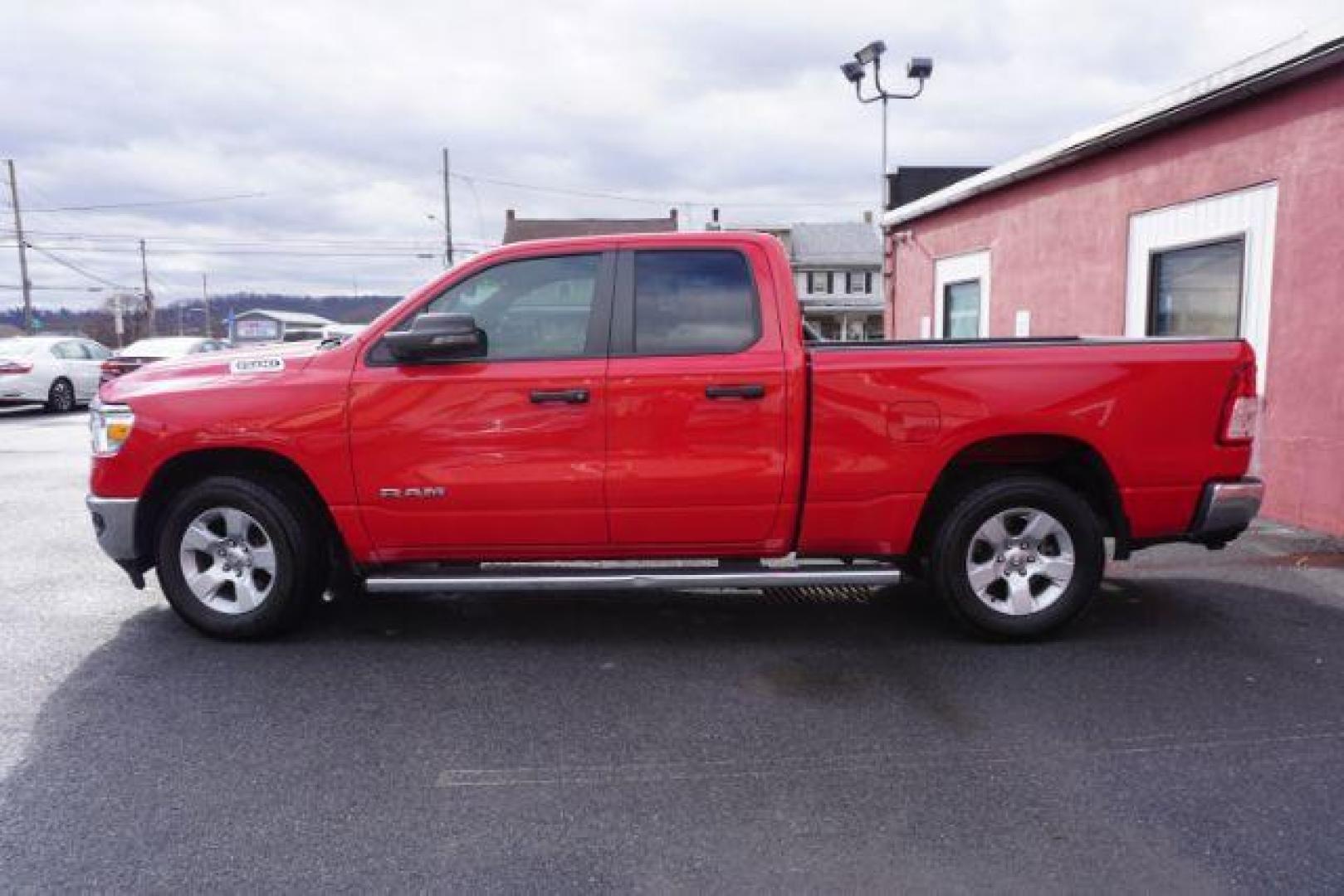 2023 Flame Red Clearcoat /Diesel Gray/Black Ram 1500 Big Horn Quad Cab 4x4 6'4 Box (1C6SRFBT8PN) , located at 312 Centre Ave, Schuylkill Haven, PA, 17972, (570) 593-5278, 40.638130, -76.177383 - Photo#0