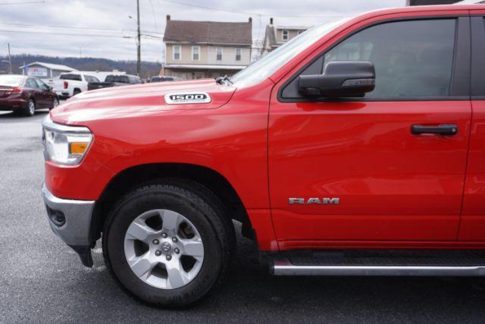 2023 Flame Red Clearcoat /Diesel Gray/Black Ram 1500 Big Horn Quad Cab 4x4 6'4 Box (1C6SRFBT8PN) , located at 312 Centre Ave, Schuylkill Haven, PA, 17972, (570) 593-5278, 40.638130, -76.177383 - Photo#1