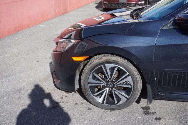 2017 Cosmic Blue Metallic /Black Honda Civic EX-T (19XFC1F38HE) with an 1.5L I-4 gasoline direct injection engine, located at 312 Centre Ave, Schuylkill Haven, PA, 17972, (570) 593-5278, 40.638130, -76.177383 - Photo#2