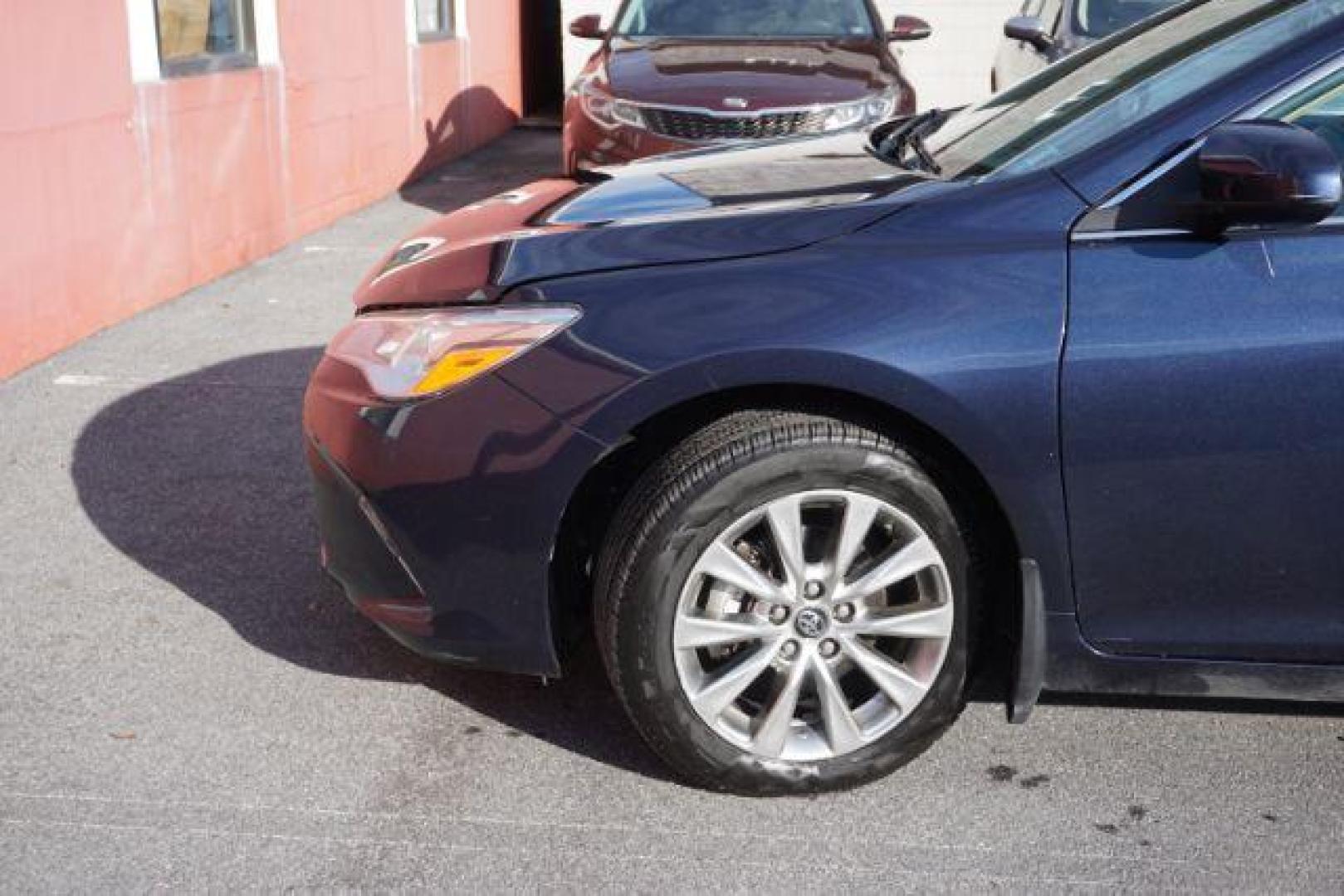 2016 Blue Crush Metallic /Almond Toyota Camry XLE (4T1BF1FK6GU) with an 2.5L I-4 DOHC engine, located at 312 Centre Ave, Schuylkill Haven, PA, 17972, (570) 593-5278, 40.638130, -76.177383- Photo#2