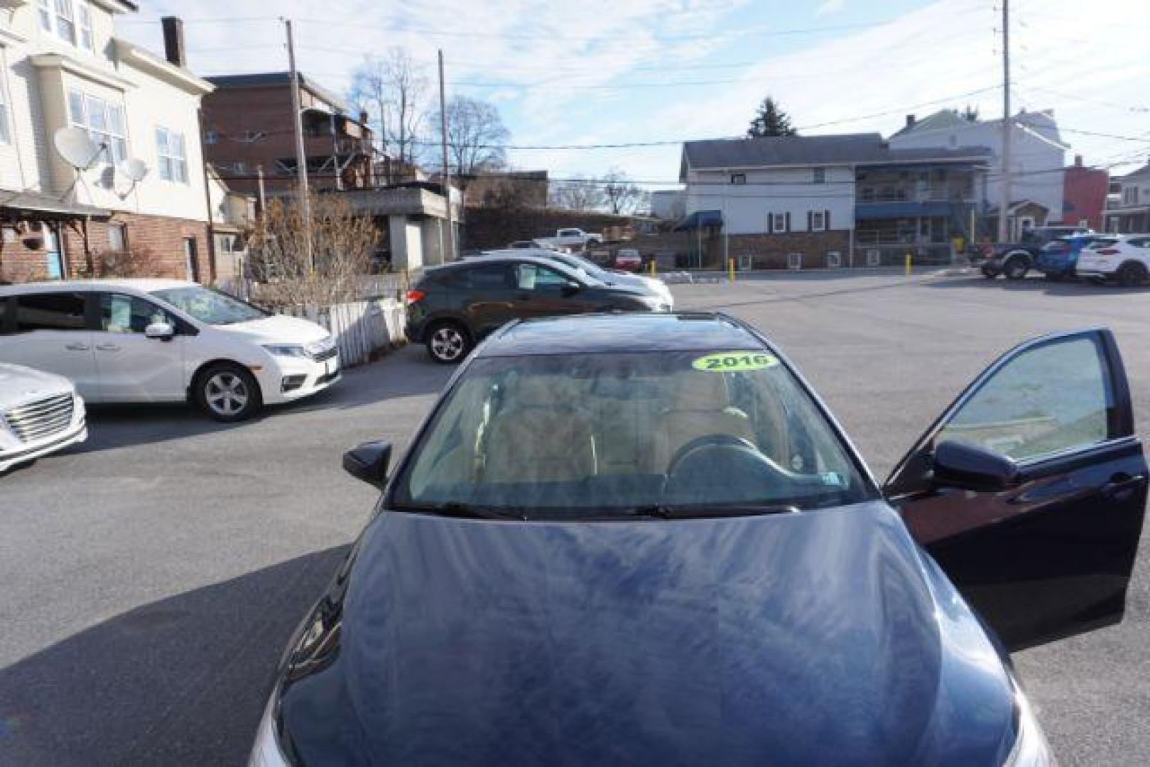 2016 Blue Crush Metallic /Almond Toyota Camry XLE (4T1BF1FK6GU) with an 2.5L I-4 DOHC engine, located at 312 Centre Ave, Schuylkill Haven, PA, 17972, (570) 593-5278, 40.638130, -76.177383- Photo#21