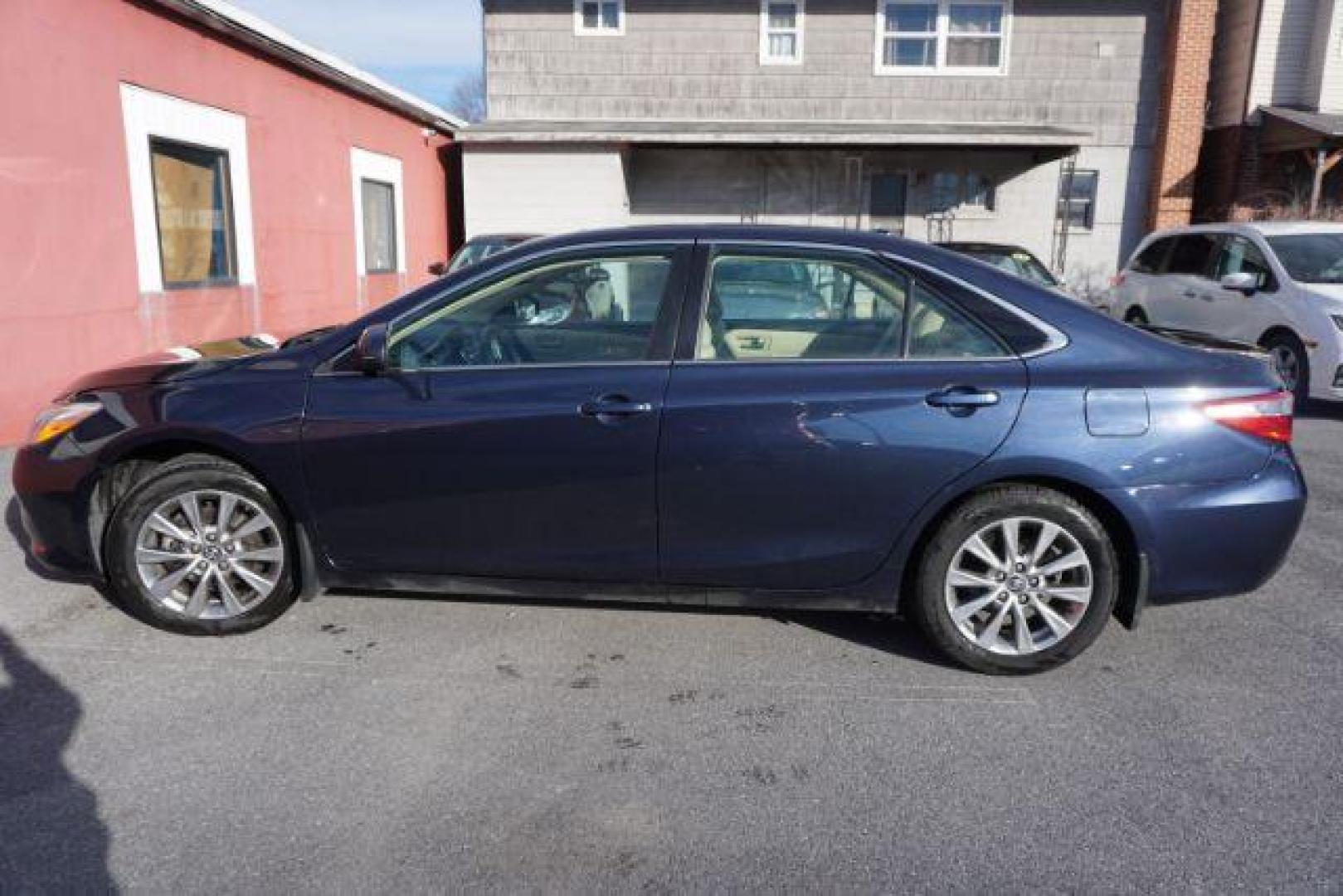 2016 Blue Crush Metallic /Almond Toyota Camry XLE (4T1BF1FK6GU) with an 2.5L I-4 DOHC engine, located at 312 Centre Ave, Schuylkill Haven, PA, 17972, (570) 593-5278, 40.638130, -76.177383- Photo#48