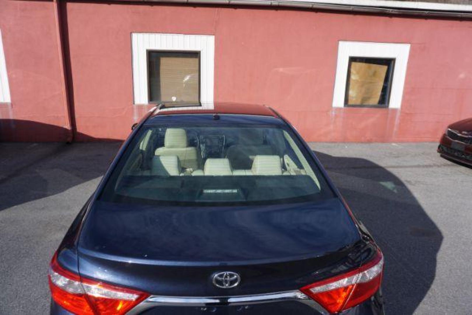 2016 Blue Crush Metallic /Almond Toyota Camry XLE (4T1BF1FK6GU) with an 2.5L I-4 DOHC engine, located at 312 Centre Ave, Schuylkill Haven, PA, 17972, (570) 593-5278, 40.638130, -76.177383- Photo#57