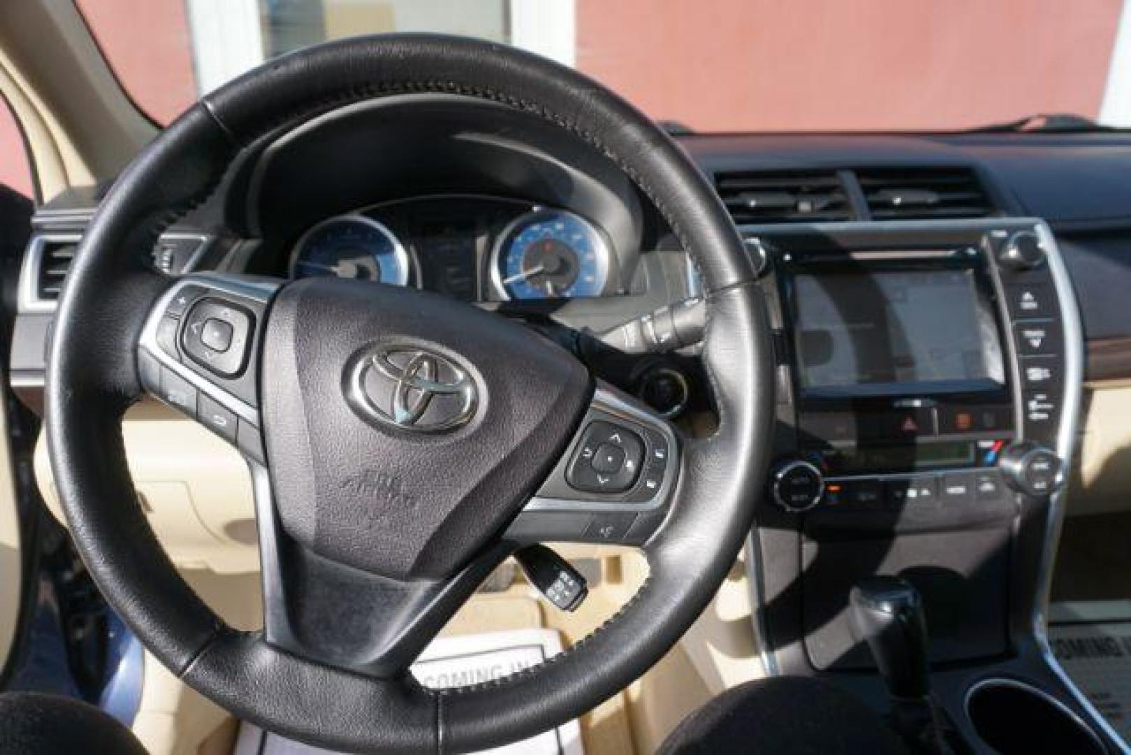 2016 Blue Crush Metallic /Almond Toyota Camry XLE (4T1BF1FK6GU) with an 2.5L I-4 DOHC engine, located at 312 Centre Ave, Schuylkill Haven, PA, 17972, (570) 593-5278, 40.638130, -76.177383- Photo#77
