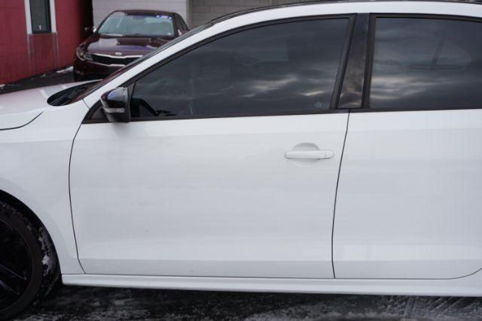 2018 Pure White w/Black Roof /Titan Black w/Black Headliner Volkswagen Jetta 1.8T SE Sport (3VWD17AJ9JM) with an 1.8L I-4 gasoline direct injection engine, located at 312 Centre Ave, Schuylkill Haven, PA, 17972, (570) 593-5278, 40.638130, -76.177383 - Photo#4