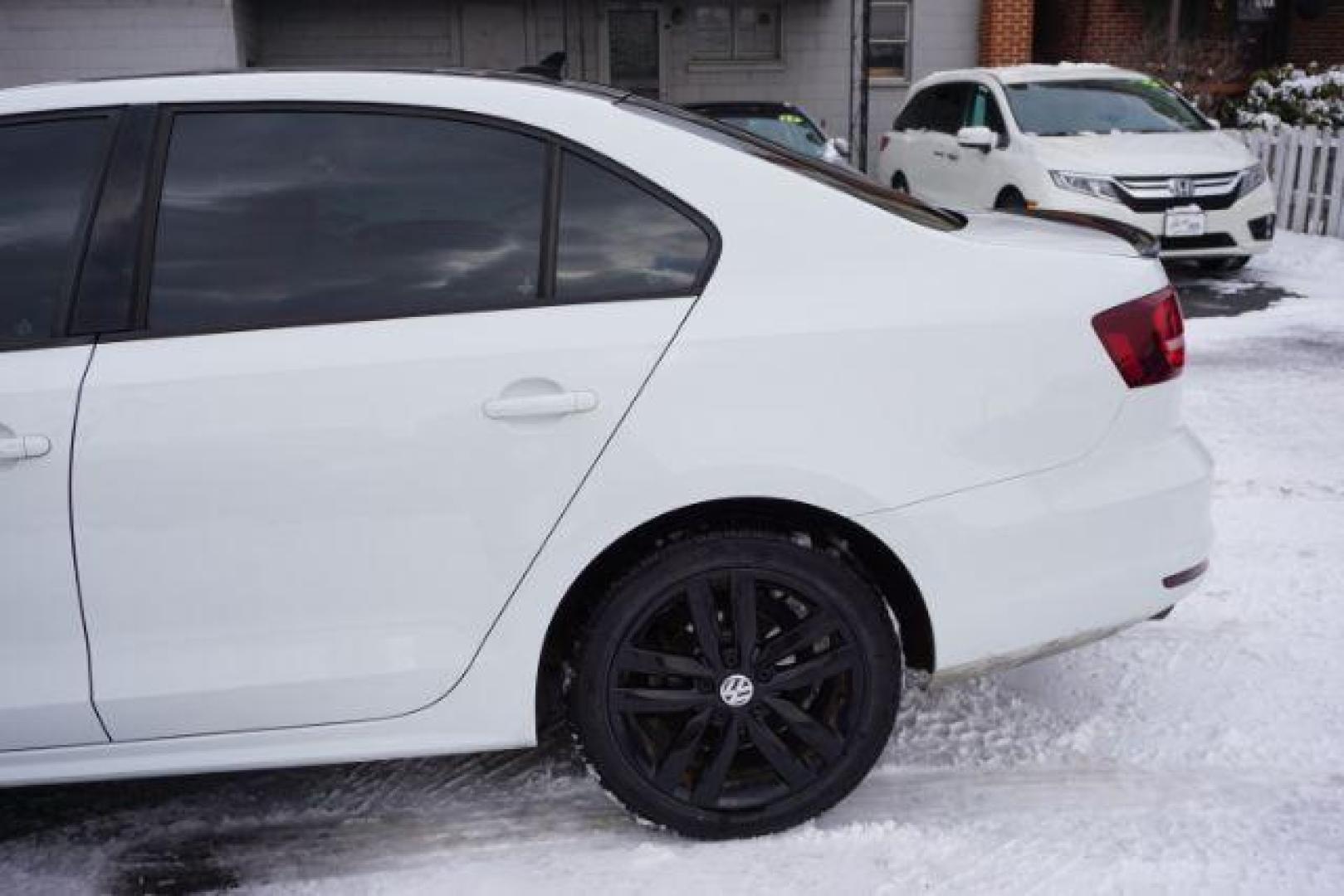 2018 Pure White w/Black Roof /Titan Black w/Black Headliner Volkswagen Jetta 1.8T SE Sport (3VWD17AJ9JM) with an 1.8L I-4 gasoline direct injection engine, located at 312 Centre Ave, Schuylkill Haven, PA, 17972, (570) 593-5278, 40.638130, -76.177383 - Photo#5