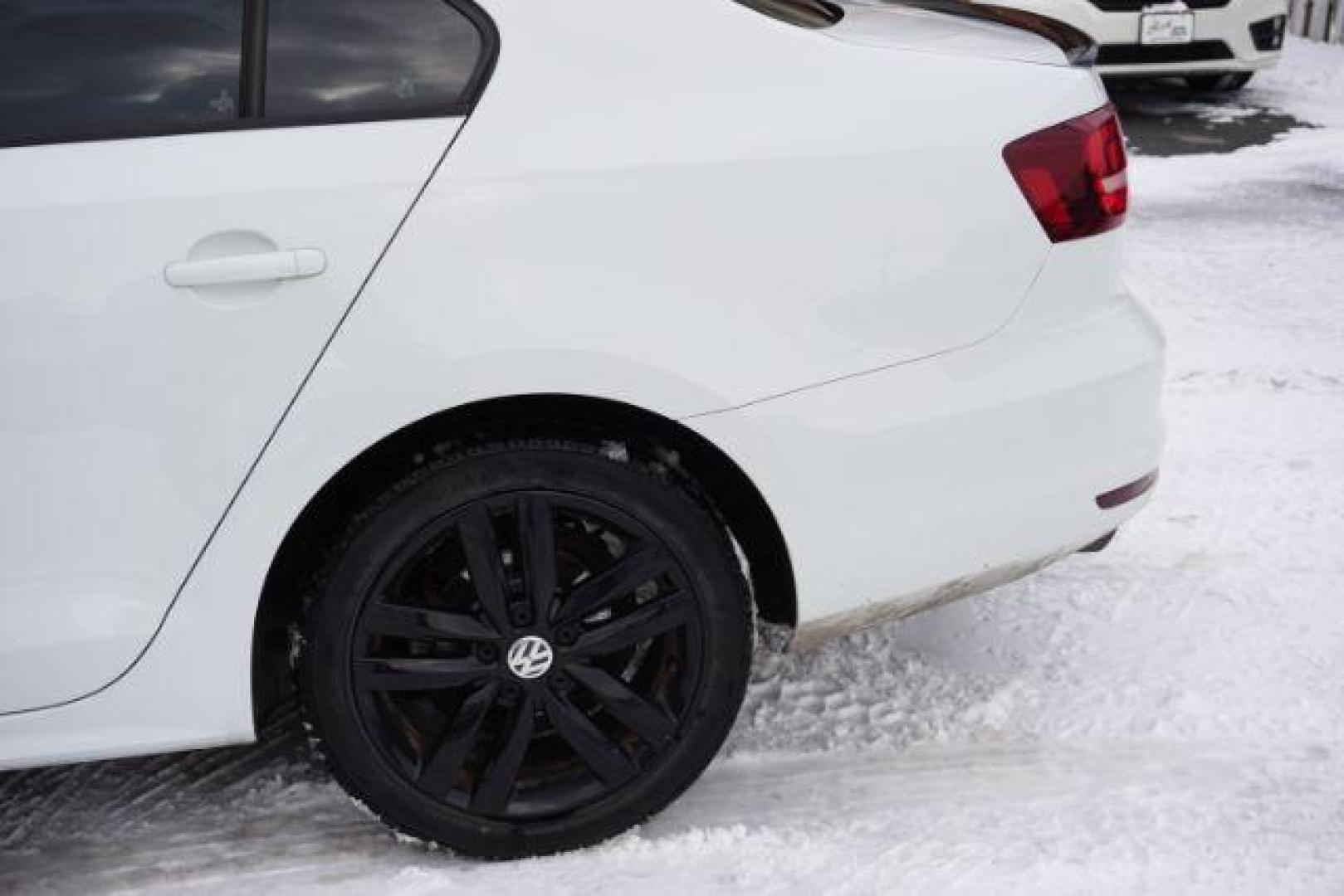 2018 Pure White w/Black Roof /Titan Black w/Black Headliner Volkswagen Jetta 1.8T SE Sport (3VWD17AJ9JM) with an 1.8L I-4 gasoline direct injection engine, located at 312 Centre Ave, Schuylkill Haven, PA, 17972, (570) 593-5278, 40.638130, -76.177383 - Photo#6