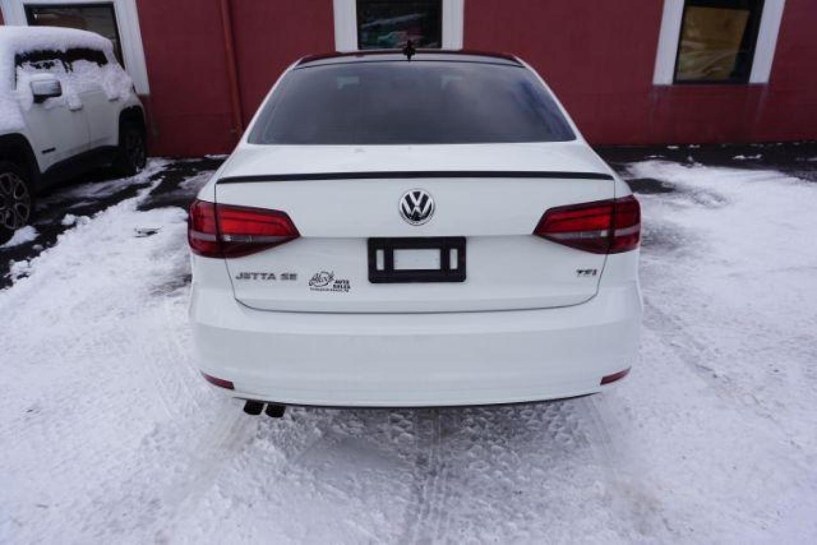 2018 Pure White w/Black Roof /Titan Black w/Black Headliner Volkswagen Jetta 1.8T SE Sport (3VWD17AJ9JM) with an 1.8L I-4 gasoline direct injection engine, located at 312 Centre Ave, Schuylkill Haven, PA, 17972, (570) 593-5278, 40.638130, -76.177383 - Photo#9
