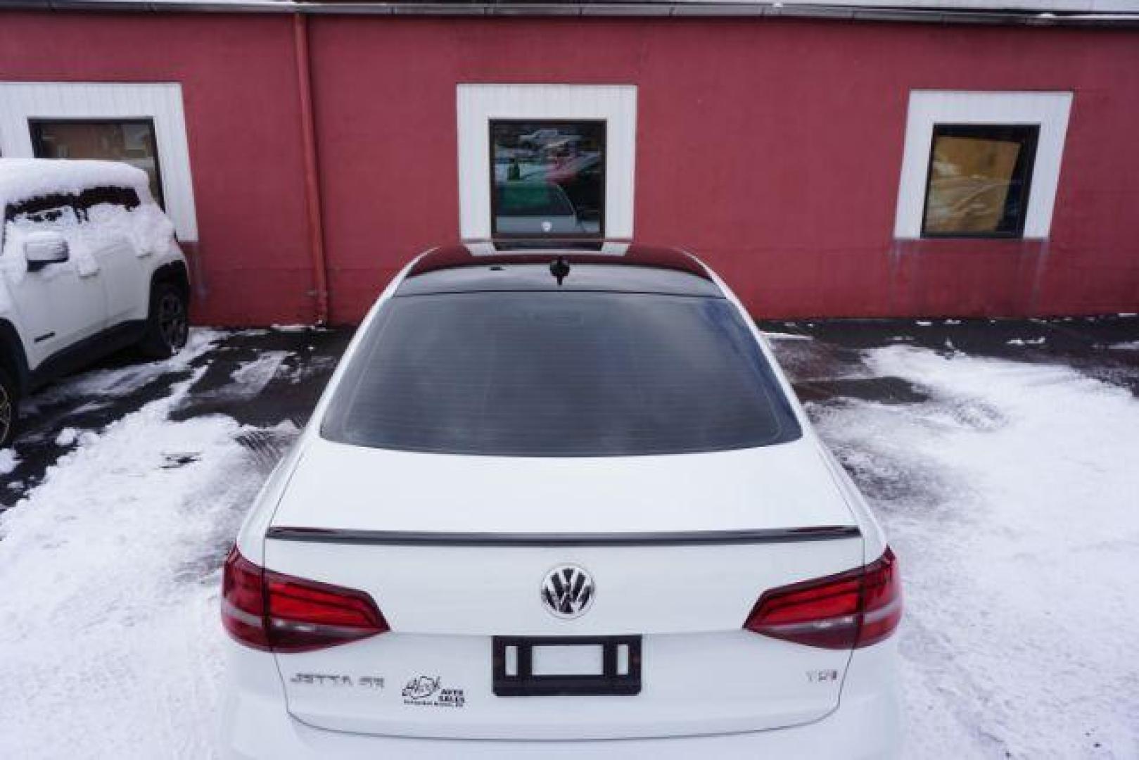 2018 Pure White w/Black Roof /Titan Black w/Black Headliner Volkswagen Jetta 1.8T SE Sport (3VWD17AJ9JM) with an 1.8L I-4 gasoline direct injection engine, located at 312 Centre Ave, Schuylkill Haven, PA, 17972, (570) 593-5278, 40.638130, -76.177383 - Photo#10