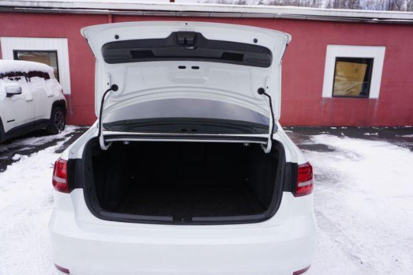 2018 Pure White w/Black Roof /Titan Black w/Black Headliner Volkswagen Jetta 1.8T SE Sport (3VWD17AJ9JM) with an 1.8L I-4 gasoline direct injection engine, located at 312 Centre Ave, Schuylkill Haven, PA, 17972, (570) 593-5278, 40.638130, -76.177383 - Photo#11