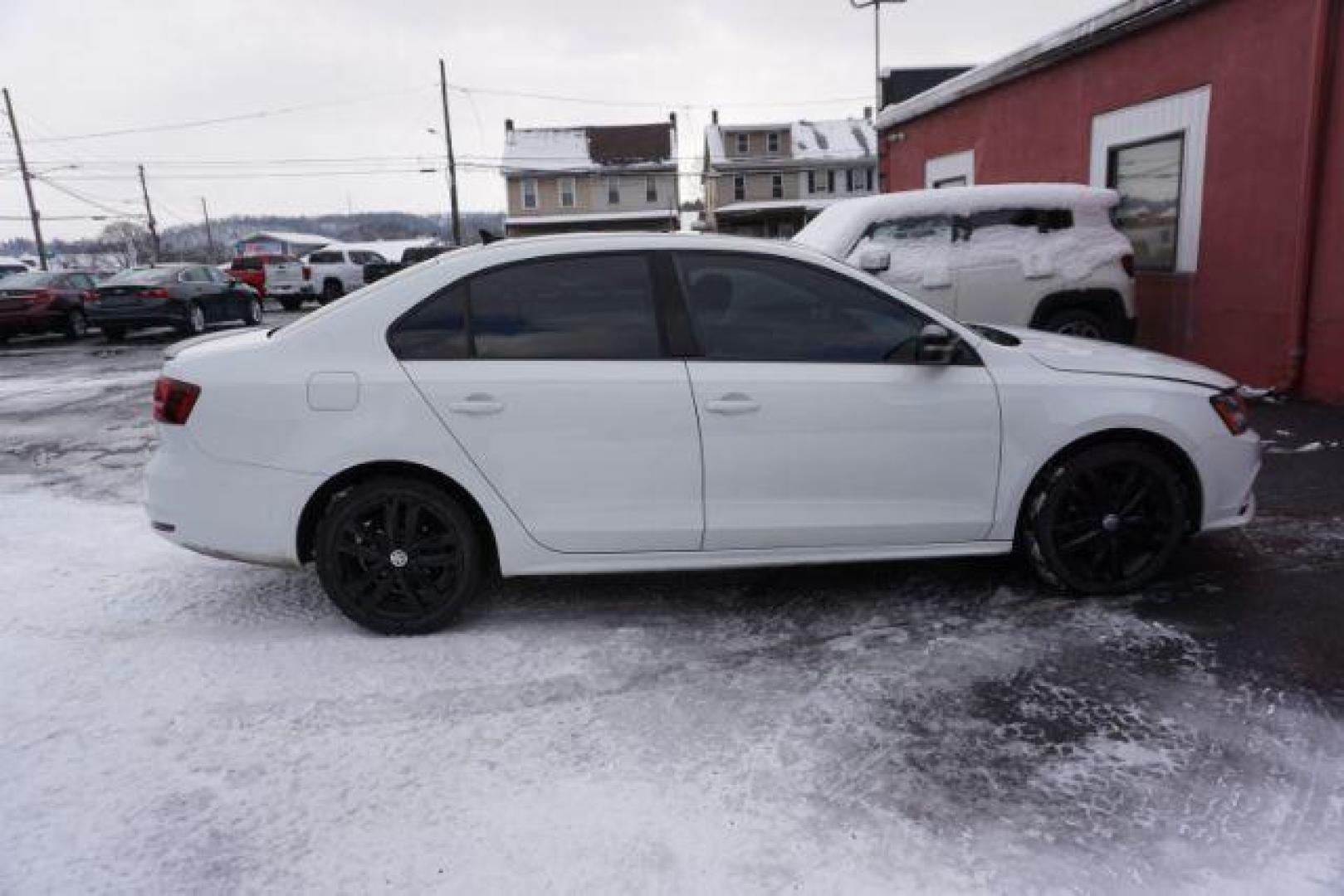 2018 Pure White w/Black Roof /Titan Black w/Black Headliner Volkswagen Jetta 1.8T SE Sport (3VWD17AJ9JM) with an 1.8L I-4 gasoline direct injection engine, located at 312 Centre Ave, Schuylkill Haven, PA, 17972, (570) 593-5278, 40.638130, -76.177383 - Photo#15
