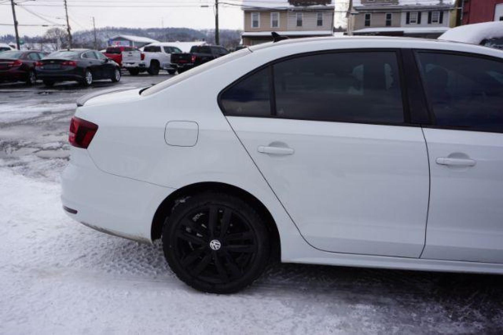 2018 Pure White w/Black Roof /Titan Black w/Black Headliner Volkswagen Jetta 1.8T SE Sport (3VWD17AJ9JM) with an 1.8L I-4 gasoline direct injection engine, located at 312 Centre Ave, Schuylkill Haven, PA, 17972, (570) 593-5278, 40.638130, -76.177383 - Photo#16