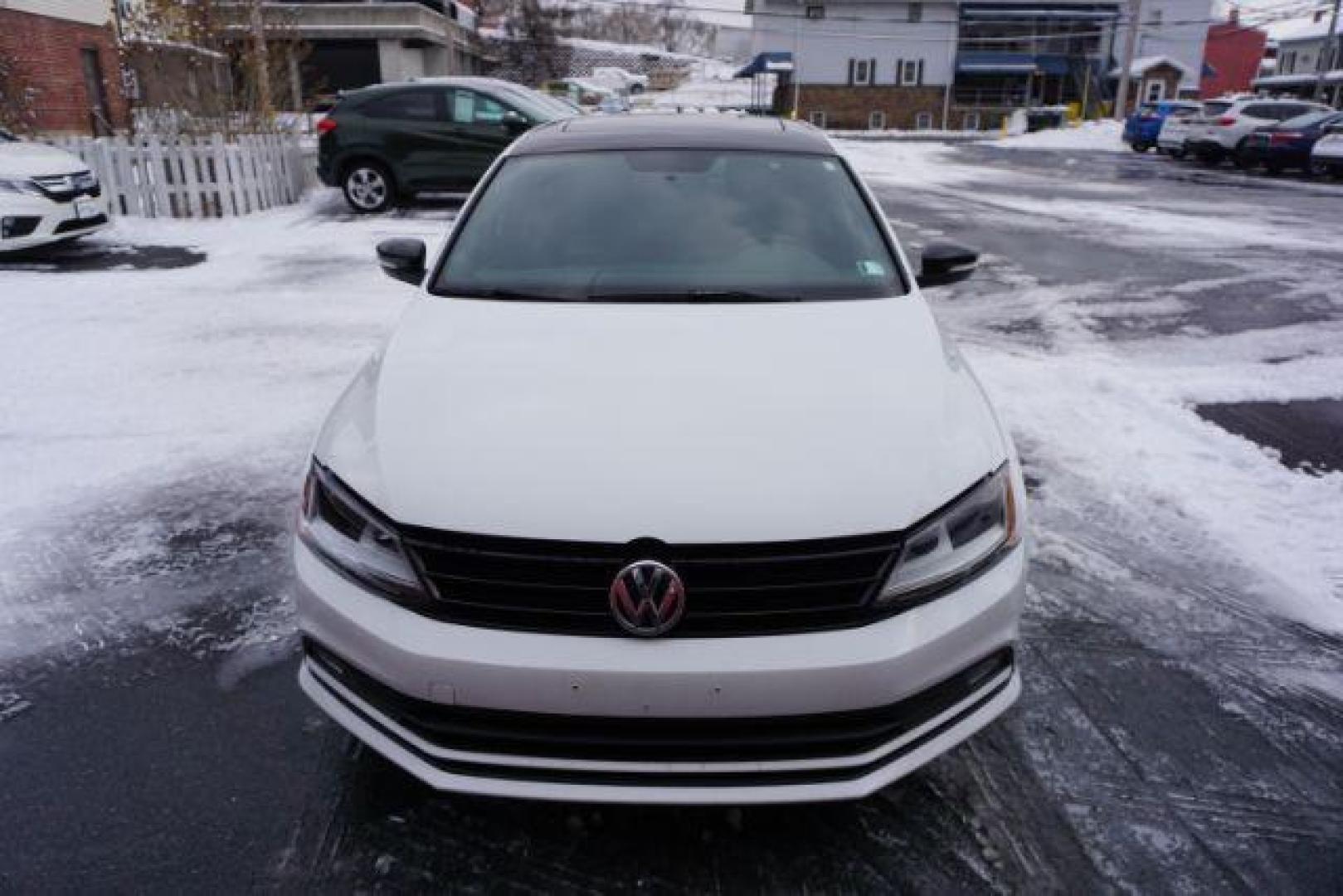 2018 Pure White w/Black Roof /Titan Black w/Black Headliner Volkswagen Jetta 1.8T SE Sport (3VWD17AJ9JM) with an 1.8L I-4 gasoline direct injection engine, located at 312 Centre Ave, Schuylkill Haven, PA, 17972, (570) 593-5278, 40.638130, -76.177383 - Photo#24
