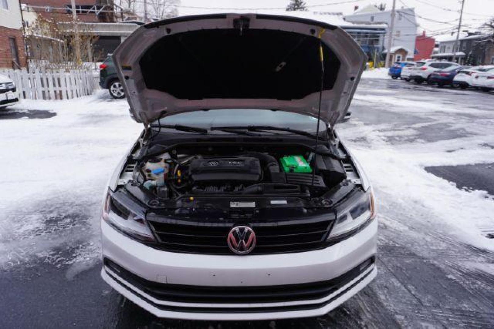 2018 Pure White w/Black Roof /Titan Black w/Black Headliner Volkswagen Jetta 1.8T SE Sport (3VWD17AJ9JM) with an 1.8L I-4 gasoline direct injection engine, located at 312 Centre Ave, Schuylkill Haven, PA, 17972, (570) 593-5278, 40.638130, -76.177383 - Photo#26