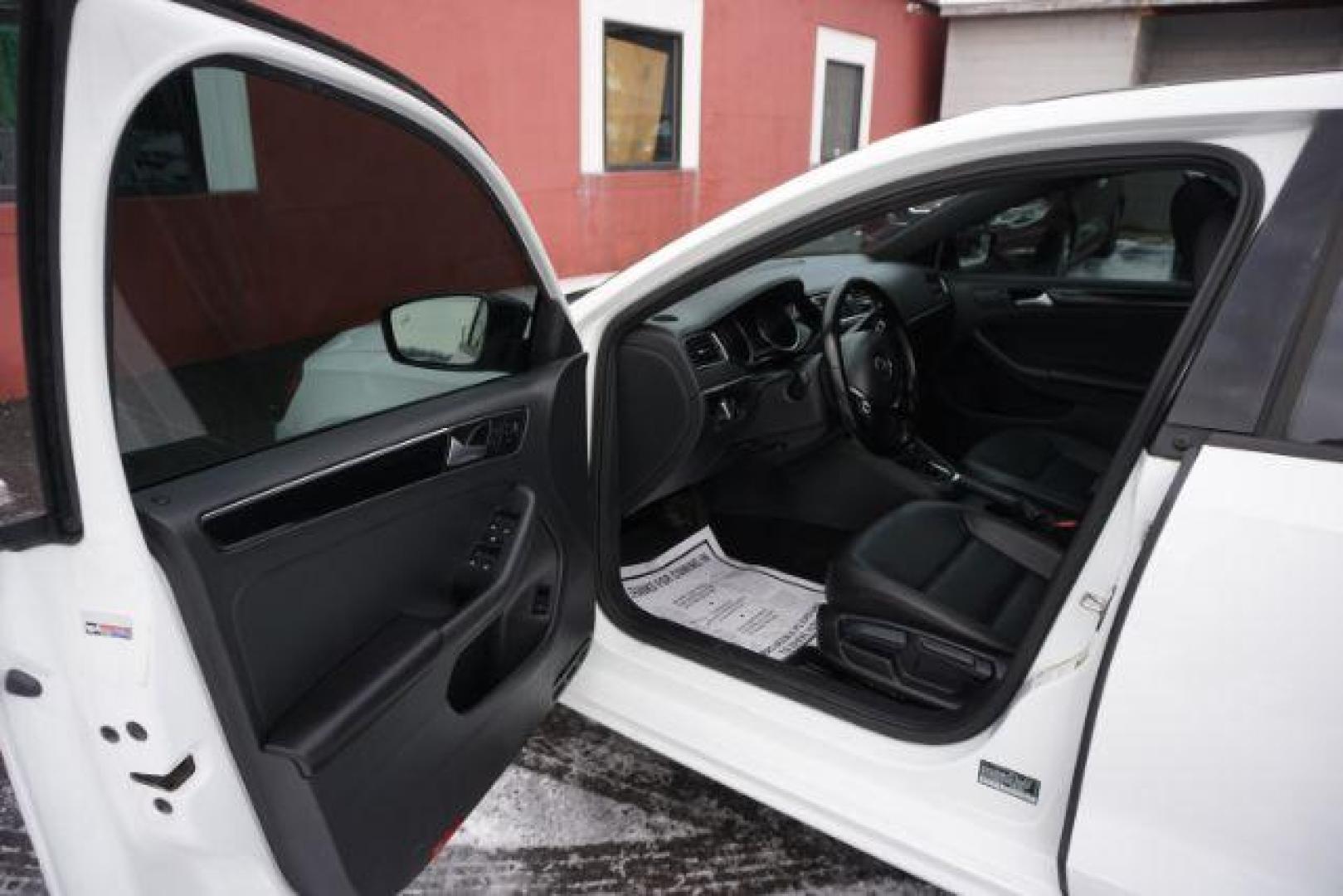2018 Pure White w/Black Roof /Titan Black w/Black Headliner Volkswagen Jetta 1.8T SE Sport (3VWD17AJ9JM) with an 1.8L I-4 gasoline direct injection engine, located at 312 Centre Ave, Schuylkill Haven, PA, 17972, (570) 593-5278, 40.638130, -76.177383 - Photo#28