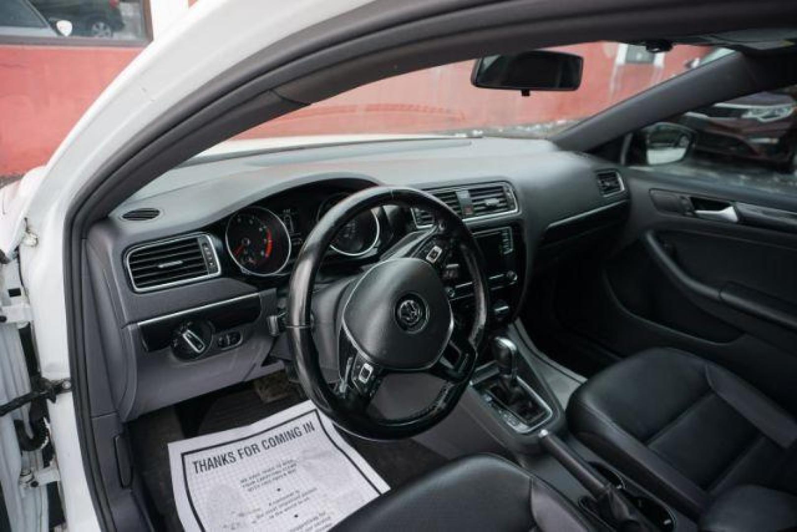 2018 Pure White w/Black Roof /Titan Black w/Black Headliner Volkswagen Jetta 1.8T SE Sport (3VWD17AJ9JM) with an 1.8L I-4 gasoline direct injection engine, located at 312 Centre Ave, Schuylkill Haven, PA, 17972, (570) 593-5278, 40.638130, -76.177383 - Photo#30