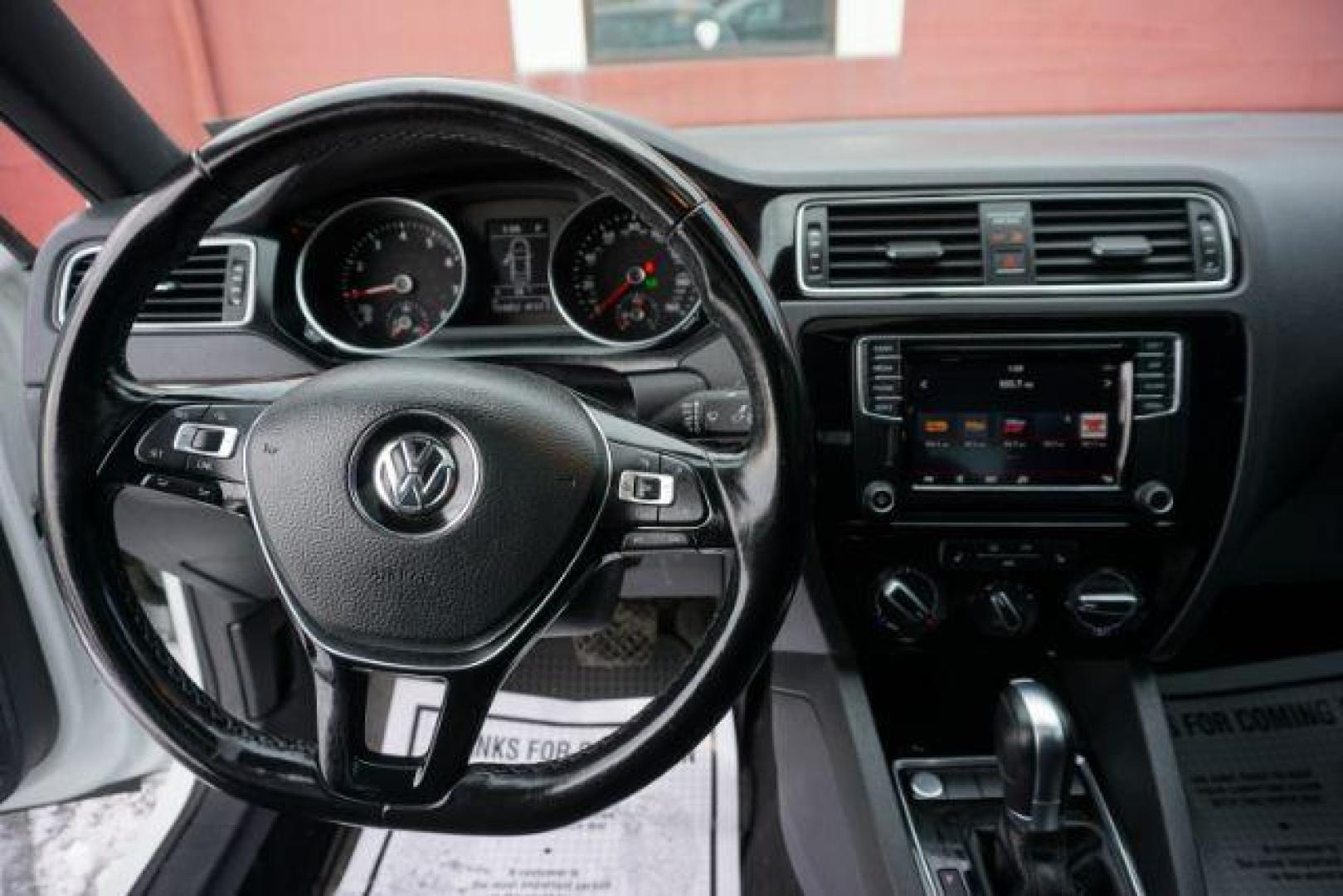 2018 Pure White w/Black Roof /Titan Black w/Black Headliner Volkswagen Jetta 1.8T SE Sport (3VWD17AJ9JM) with an 1.8L I-4 gasoline direct injection engine, located at 312 Centre Ave, Schuylkill Haven, PA, 17972, (570) 593-5278, 40.638130, -76.177383 - Photo#33