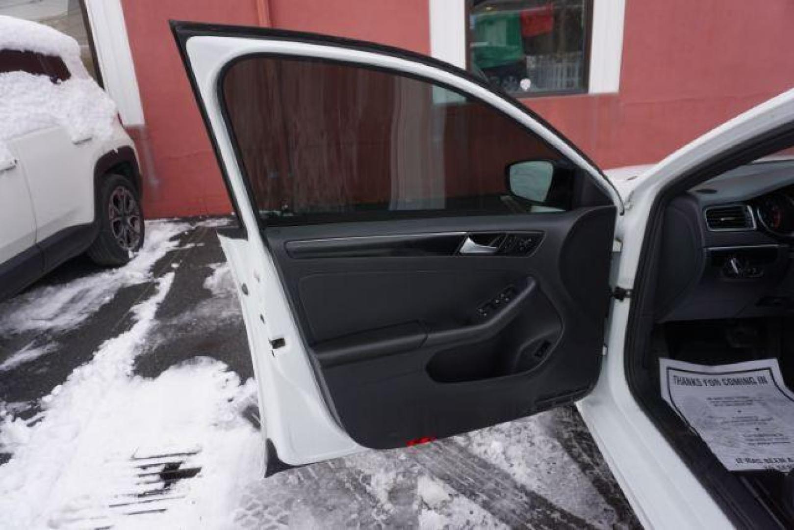 2018 Pure White w/Black Roof /Titan Black w/Black Headliner Volkswagen Jetta 1.8T SE Sport (3VWD17AJ9JM) with an 1.8L I-4 gasoline direct injection engine, located at 312 Centre Ave, Schuylkill Haven, PA, 17972, (570) 593-5278, 40.638130, -76.177383 - Photo#34