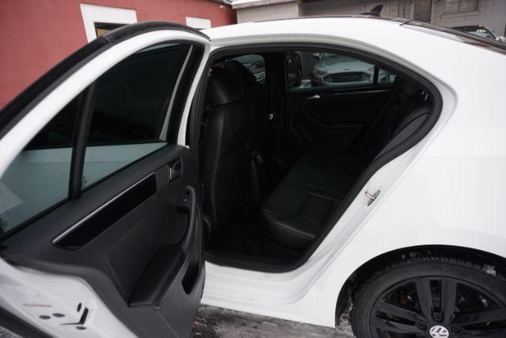 2018 Pure White w/Black Roof /Titan Black w/Black Headliner Volkswagen Jetta 1.8T SE Sport (3VWD17AJ9JM) with an 1.8L I-4 gasoline direct injection engine, located at 312 Centre Ave, Schuylkill Haven, PA, 17972, (570) 593-5278, 40.638130, -76.177383 - Photo#36