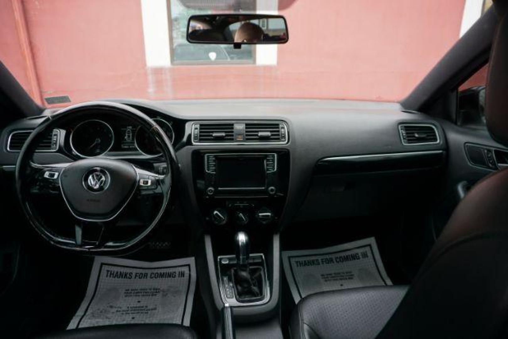 2018 Pure White w/Black Roof /Titan Black w/Black Headliner Volkswagen Jetta 1.8T SE Sport (3VWD17AJ9JM) with an 1.8L I-4 gasoline direct injection engine, located at 312 Centre Ave, Schuylkill Haven, PA, 17972, (570) 593-5278, 40.638130, -76.177383 - Photo#39