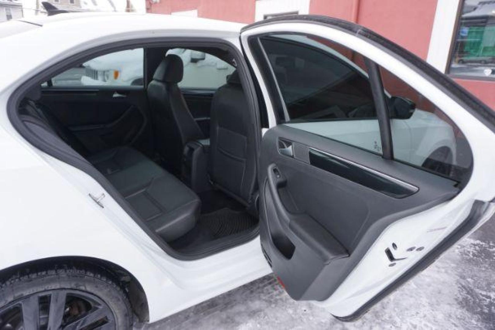 2018 Pure White w/Black Roof /Titan Black w/Black Headliner Volkswagen Jetta 1.8T SE Sport (3VWD17AJ9JM) with an 1.8L I-4 gasoline direct injection engine, located at 312 Centre Ave, Schuylkill Haven, PA, 17972, (570) 593-5278, 40.638130, -76.177383 - Photo#41