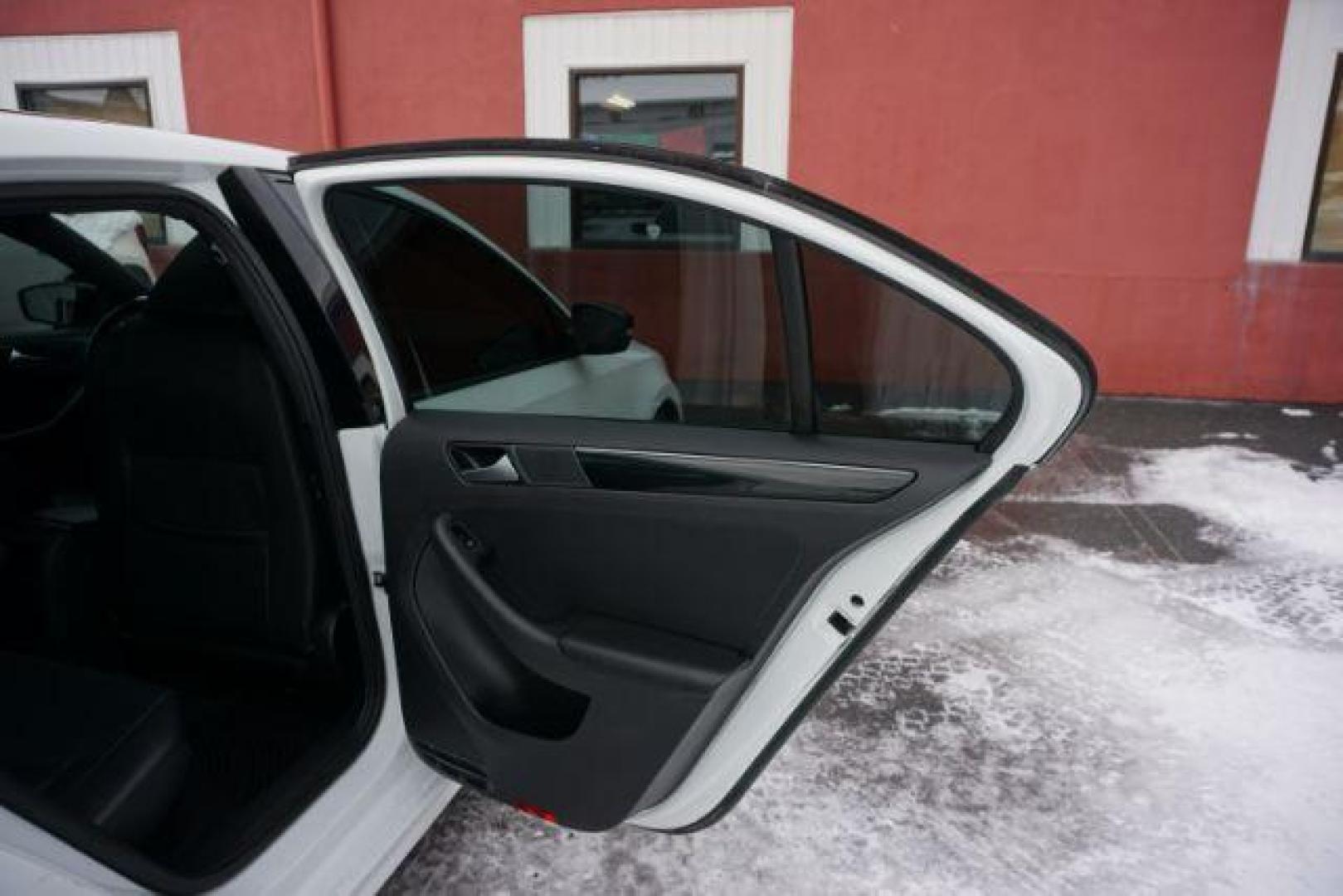 2018 Pure White w/Black Roof /Titan Black w/Black Headliner Volkswagen Jetta 1.8T SE Sport (3VWD17AJ9JM) with an 1.8L I-4 gasoline direct injection engine, located at 312 Centre Ave, Schuylkill Haven, PA, 17972, (570) 593-5278, 40.638130, -76.177383 - Photo#45