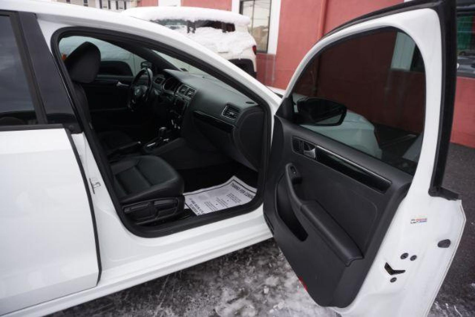 2018 Pure White w/Black Roof /Titan Black w/Black Headliner Volkswagen Jetta 1.8T SE Sport (3VWD17AJ9JM) with an 1.8L I-4 gasoline direct injection engine, located at 312 Centre Ave, Schuylkill Haven, PA, 17972, (570) 593-5278, 40.638130, -76.177383 - Photo#46