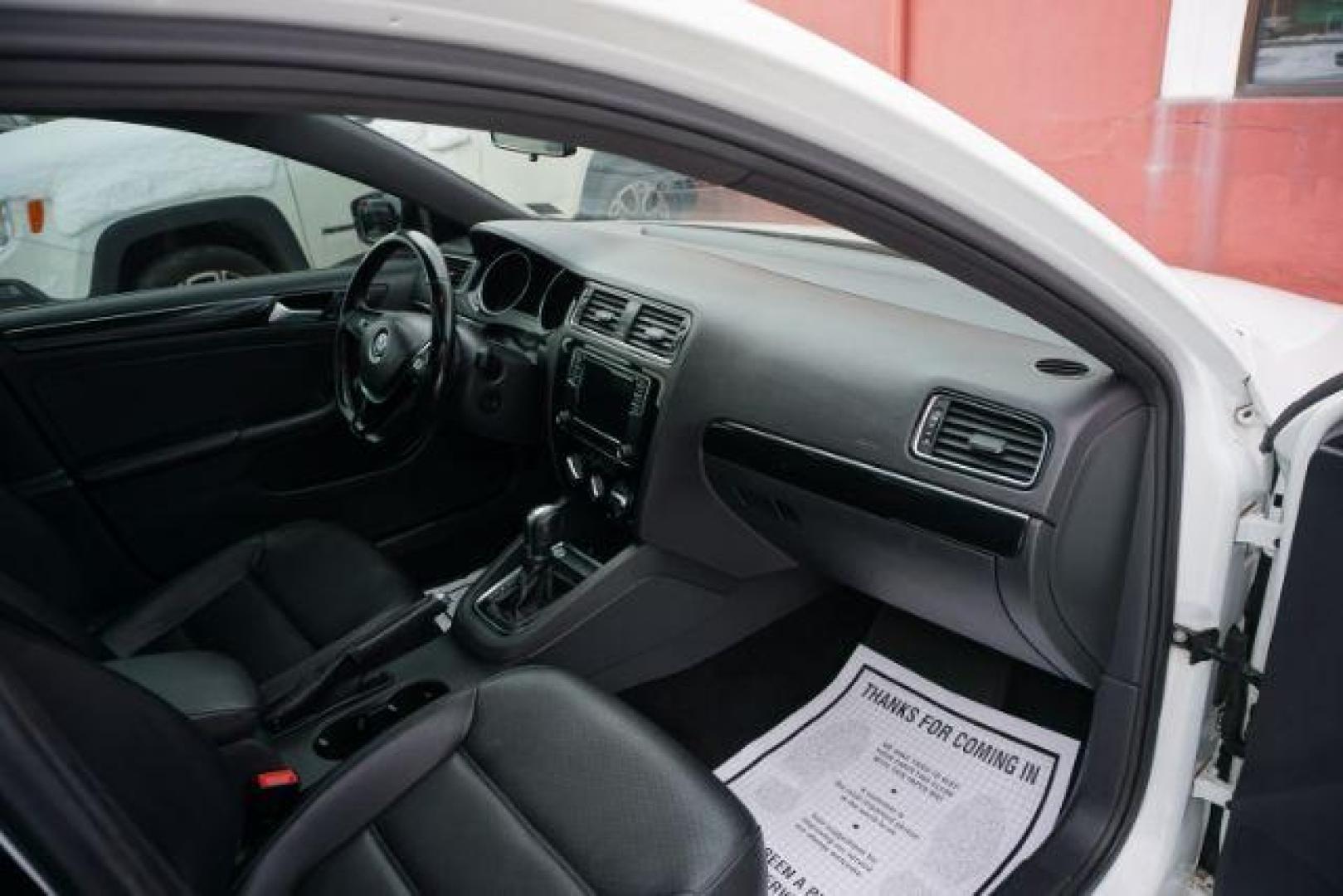 2018 Pure White w/Black Roof /Titan Black w/Black Headliner Volkswagen Jetta 1.8T SE Sport (3VWD17AJ9JM) with an 1.8L I-4 gasoline direct injection engine, located at 312 Centre Ave, Schuylkill Haven, PA, 17972, (570) 593-5278, 40.638130, -76.177383 - Photo#48