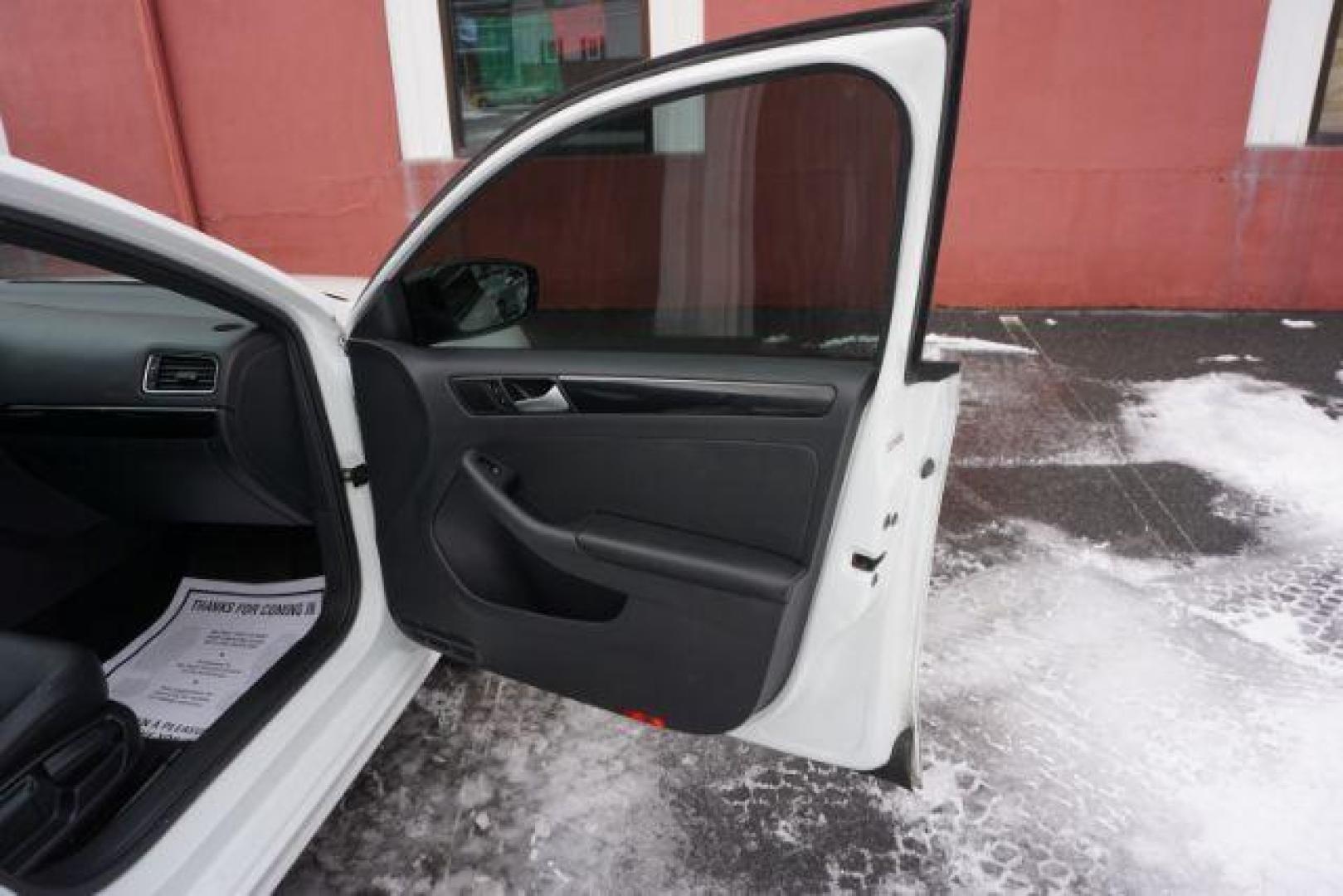 2018 Pure White w/Black Roof /Titan Black w/Black Headliner Volkswagen Jetta 1.8T SE Sport (3VWD17AJ9JM) with an 1.8L I-4 gasoline direct injection engine, located at 312 Centre Ave, Schuylkill Haven, PA, 17972, (570) 593-5278, 40.638130, -76.177383 - Photo#51