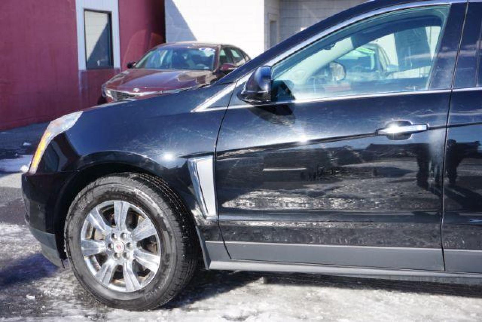 2016 Black Raven /Ebony/Ebony Accents Cadillac SRX Luxury Collection (3GYFNEE39GS) with an 3.6L V-6 gasoline direct injection engine, located at 312 Centre Ave, Schuylkill Haven, PA, 17972, (570) 593-5278, 40.638130, -76.177383 - Photo#1