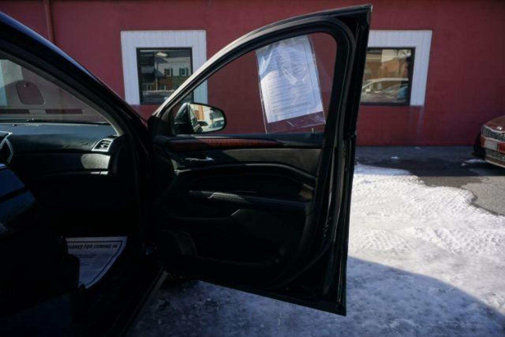 2016 Black Raven /Ebony/Ebony Accents Cadillac SRX Luxury Collection (3GYFNEE39GS) with an 3.6L V-6 gasoline direct injection engine, located at 312 Centre Ave, Schuylkill Haven, PA, 17972, (570) 593-5278, 40.638130, -76.177383 - Photo#48