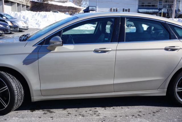 2015 Bronze Fire Metallic Tinted Clearcoat /Ebony Ford Fusion SE (3FA6P0T95FR) with an EcoBoost 2L I-4 gasoline direct injection engine, located at 312 Centre Ave, Schuylkill Haven, PA, 17972, (570) 593-5278, 40.638130, -76.177383 - Photo#2