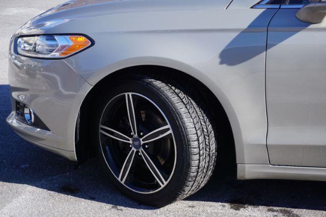 2015 Bronze Fire Metallic Tinted Clearcoat /Ebony Ford Fusion SE (3FA6P0T95FR) with an EcoBoost 2L I-4 gasoline direct injection engine, located at 312 Centre Ave, Schuylkill Haven, PA, 17972, (570) 593-5278, 40.638130, -76.177383 - Photo#3