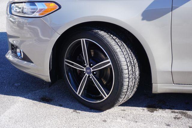2015 Bronze Fire Metallic Tinted Clearcoat /Ebony Ford Fusion SE (3FA6P0T95FR) with an EcoBoost 2L I-4 gasoline direct injection engine, located at 312 Centre Ave, Schuylkill Haven, PA, 17972, (570) 593-5278, 40.638130, -76.177383 - Photo#4