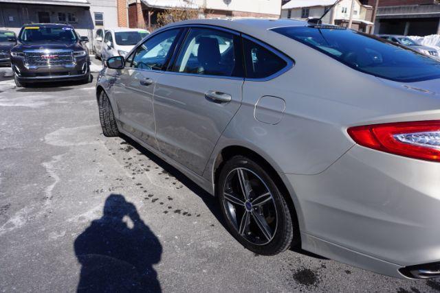 2015 Bronze Fire Metallic Tinted Clearcoat /Ebony Ford Fusion SE (3FA6P0T95FR) with an EcoBoost 2L I-4 gasoline direct injection engine, located at 312 Centre Ave, Schuylkill Haven, PA, 17972, (570) 593-5278, 40.638130, -76.177383 - Photo#9