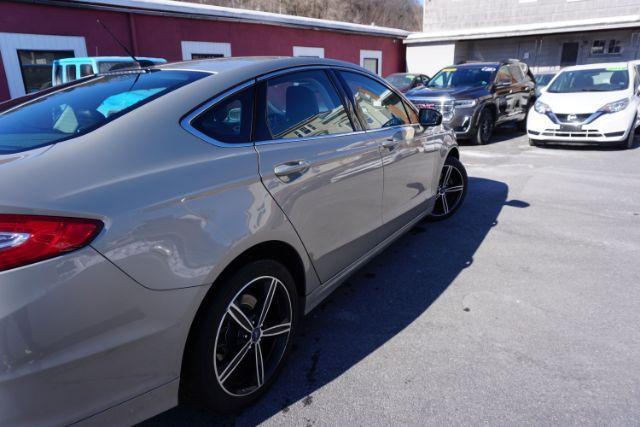 2015 Bronze Fire Metallic Tinted Clearcoat /Ebony Ford Fusion SE (3FA6P0T95FR) with an EcoBoost 2L I-4 gasoline direct injection engine, located at 312 Centre Ave, Schuylkill Haven, PA, 17972, (570) 593-5278, 40.638130, -76.177383 - Photo#13