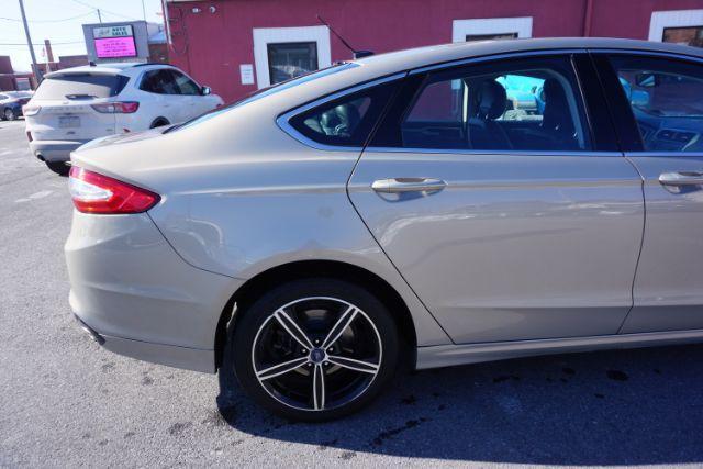 2015 Bronze Fire Metallic Tinted Clearcoat /Ebony Ford Fusion SE (3FA6P0T95FR) with an EcoBoost 2L I-4 gasoline direct injection engine, located at 312 Centre Ave, Schuylkill Haven, PA, 17972, (570) 593-5278, 40.638130, -76.177383 - Photo#14