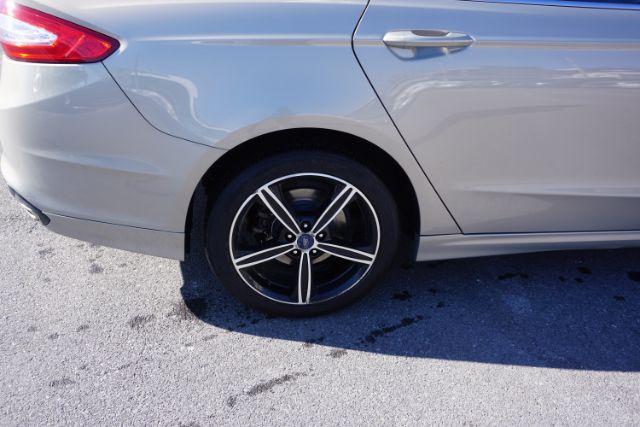 2015 Bronze Fire Metallic Tinted Clearcoat /Ebony Ford Fusion SE (3FA6P0T95FR) with an EcoBoost 2L I-4 gasoline direct injection engine, located at 312 Centre Ave, Schuylkill Haven, PA, 17972, (570) 593-5278, 40.638130, -76.177383 - Photo#16