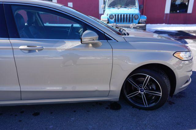 2015 Bronze Fire Metallic Tinted Clearcoat /Ebony Ford Fusion SE (3FA6P0T95FR) with an EcoBoost 2L I-4 gasoline direct injection engine, located at 312 Centre Ave, Schuylkill Haven, PA, 17972, (570) 593-5278, 40.638130, -76.177383 - Photo#18