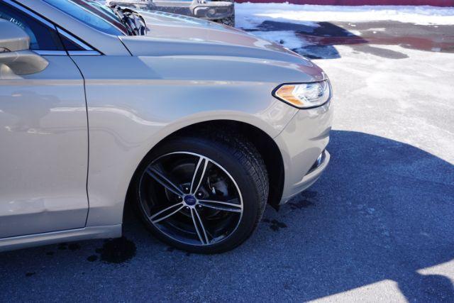 2015 Bronze Fire Metallic Tinted Clearcoat /Ebony Ford Fusion SE (3FA6P0T95FR) with an EcoBoost 2L I-4 gasoline direct injection engine, located at 312 Centre Ave, Schuylkill Haven, PA, 17972, (570) 593-5278, 40.638130, -76.177383 - Photo#20