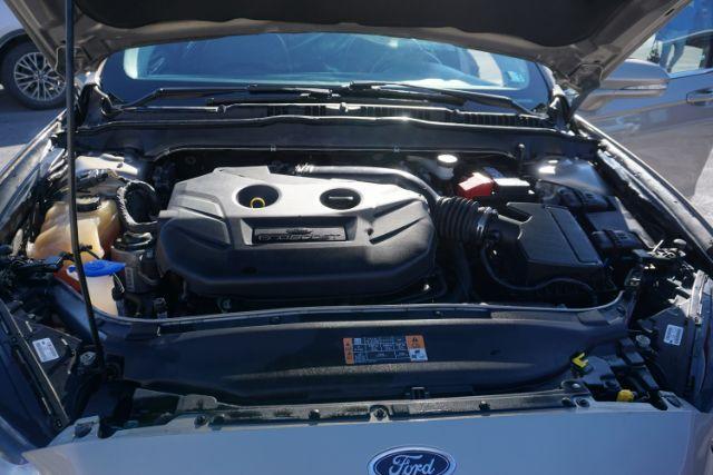 2015 Bronze Fire Metallic Tinted Clearcoat /Ebony Ford Fusion SE (3FA6P0T95FR) with an EcoBoost 2L I-4 gasoline direct injection engine, located at 312 Centre Ave, Schuylkill Haven, PA, 17972, (570) 593-5278, 40.638130, -76.177383 - Photo#25