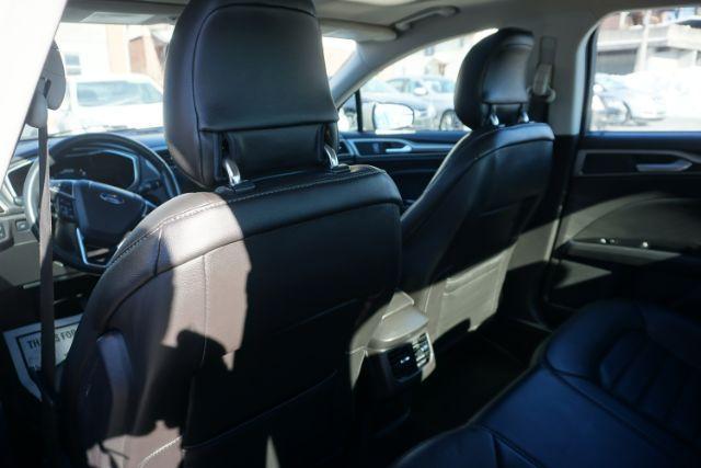 2015 Bronze Fire Metallic Tinted Clearcoat /Ebony Ford Fusion SE (3FA6P0T95FR) with an EcoBoost 2L I-4 gasoline direct injection engine, located at 312 Centre Ave, Schuylkill Haven, PA, 17972, (570) 593-5278, 40.638130, -76.177383 - Photo#36