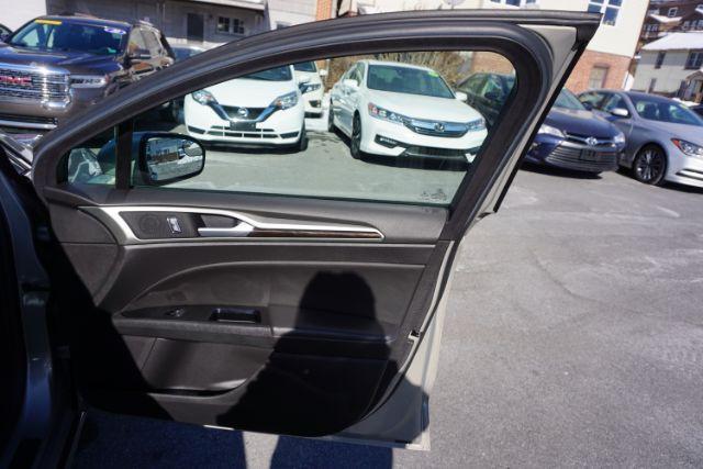 2015 Bronze Fire Metallic Tinted Clearcoat /Ebony Ford Fusion SE (3FA6P0T95FR) with an EcoBoost 2L I-4 gasoline direct injection engine, located at 312 Centre Ave, Schuylkill Haven, PA, 17972, (570) 593-5278, 40.638130, -76.177383 - Photo#47