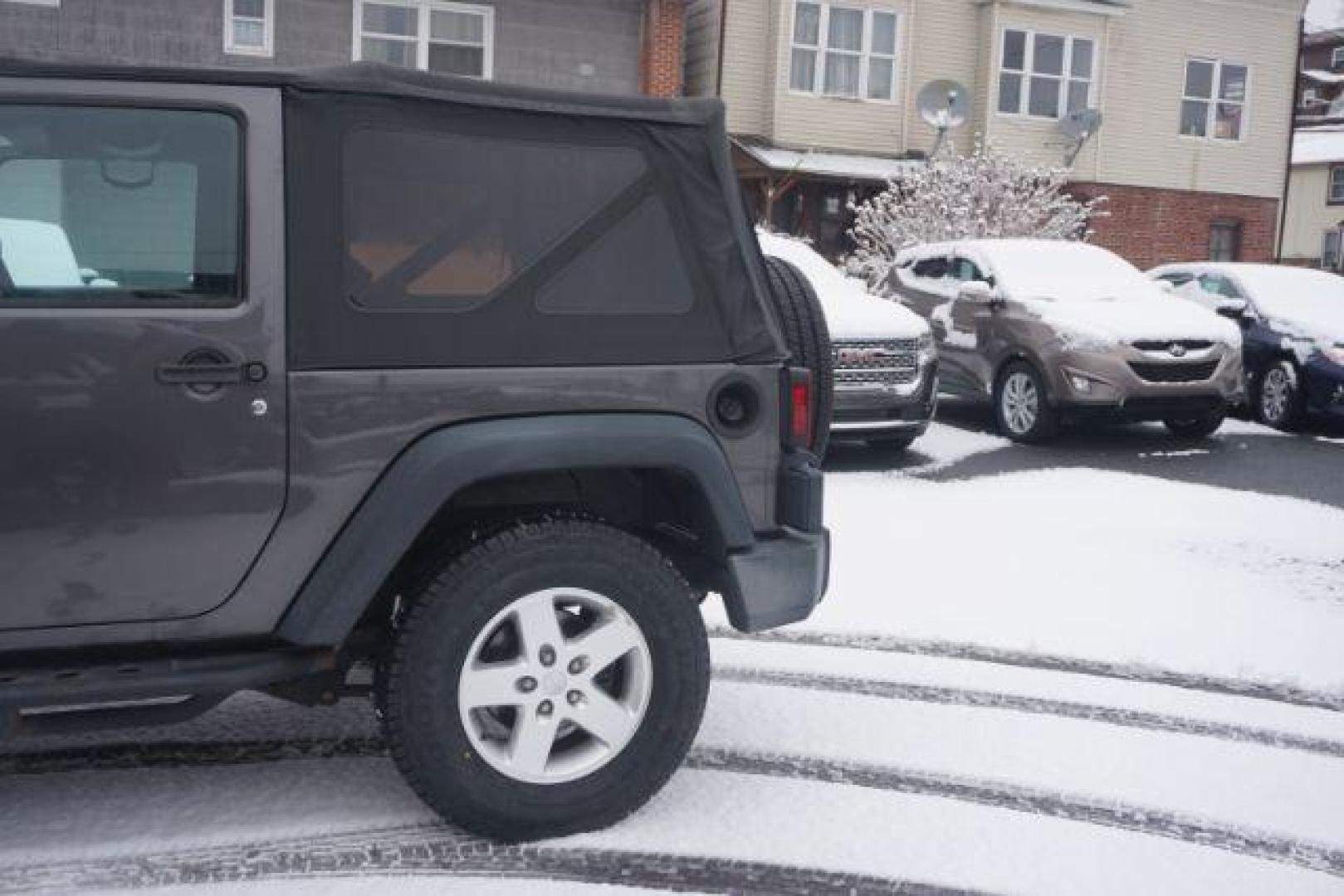 2016 Granite Crystal Metallic Clearcoat /Black Jeep Wrangler Sport (1C4AJWAG0GL) with an Pentastar 3.6L V-6 DOHC engine, located at 312 Centre Ave, Schuylkill Haven, PA, 17972, (570) 593-5278, 40.638130, -76.177383 - Photo#5