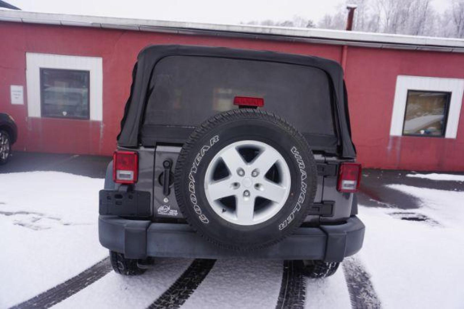 2016 Granite Crystal Metallic Clearcoat /Black Jeep Wrangler Sport (1C4AJWAG0GL) with an Pentastar 3.6L V-6 DOHC engine, located at 312 Centre Ave, Schuylkill Haven, PA, 17972, (570) 593-5278, 40.638130, -76.177383 - Photo#9
