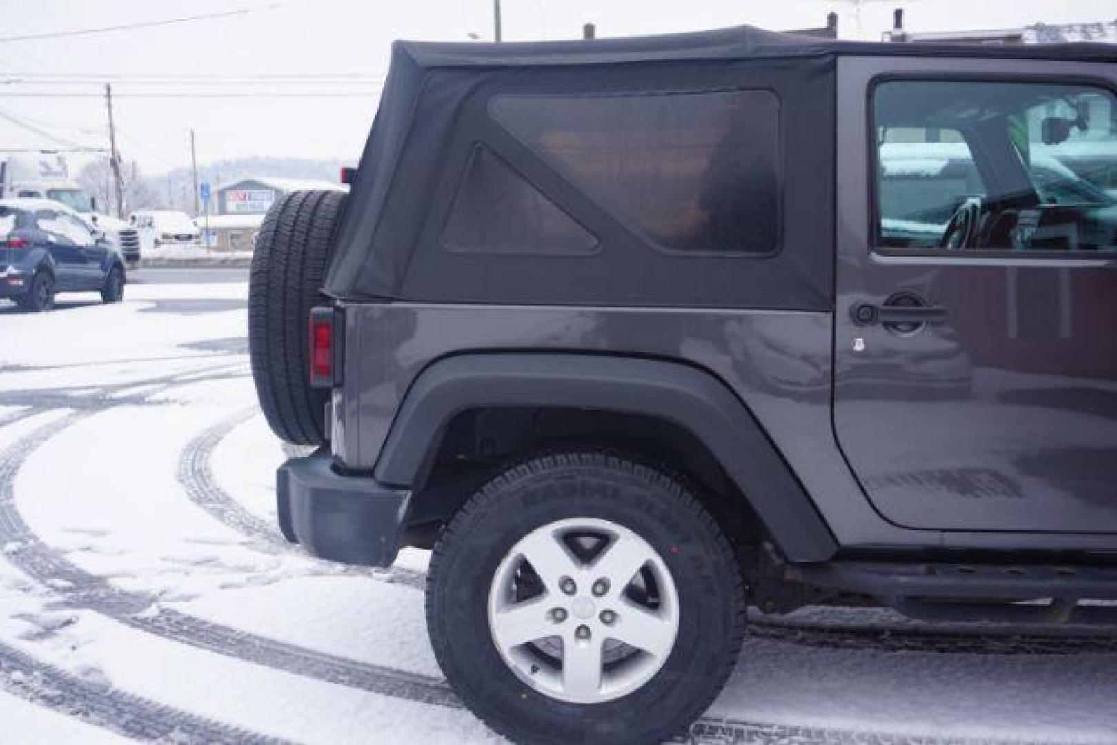 2016 Granite Crystal Metallic Clearcoat /Black Jeep Wrangler Sport (1C4AJWAG0GL) with an Pentastar 3.6L V-6 DOHC engine, located at 312 Centre Ave, Schuylkill Haven, PA, 17972, (570) 593-5278, 40.638130, -76.177383 - Photo#14
