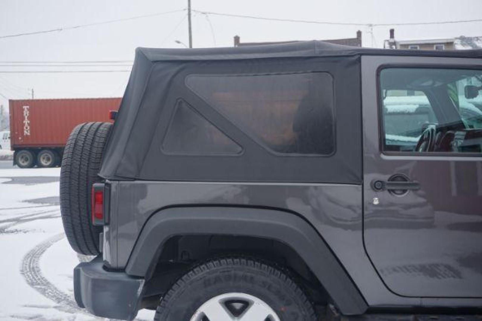 2016 Granite Crystal Metallic Clearcoat /Black Jeep Wrangler Sport (1C4AJWAG0GL) with an Pentastar 3.6L V-6 DOHC engine, located at 312 Centre Ave, Schuylkill Haven, PA, 17972, (570) 593-5278, 40.638130, -76.177383 - Photo#15