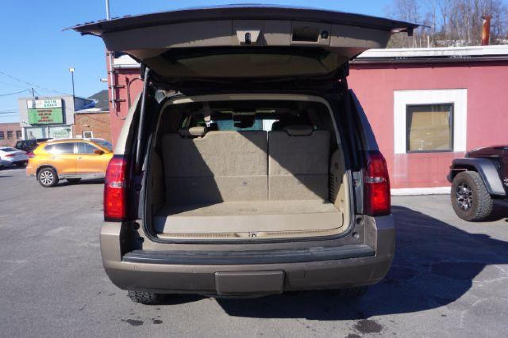 2016 BROWNSTONE METALLIC CHEVROLET TAHOE LT (1GNSKBKC6GR) with an 5.3L V8 engine, AUTOMATIC transmission, located at 312 Centre Ave, Schuylkill Haven, PA, 17972, (570) 593-5278, 40.638130, -76.177383- Photo#51